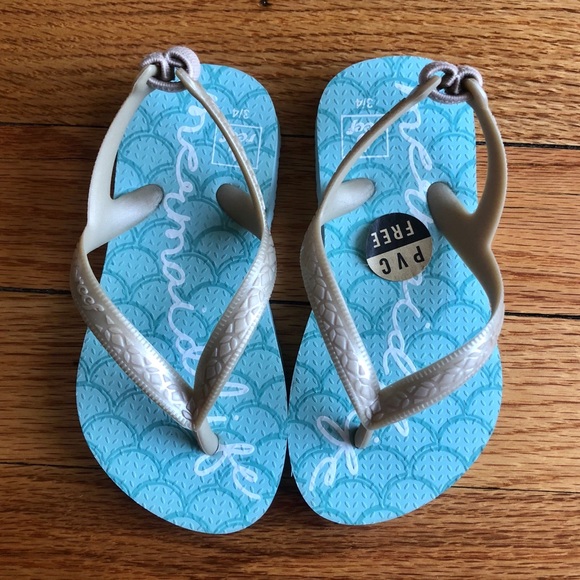 reef mermaid flip flops